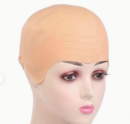 Latex bald cap on mannequin